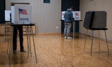 Voters cast their ballots at the Hillel Foundation in Madison