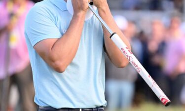 An emotional Wyndham Clark celebrates his win.