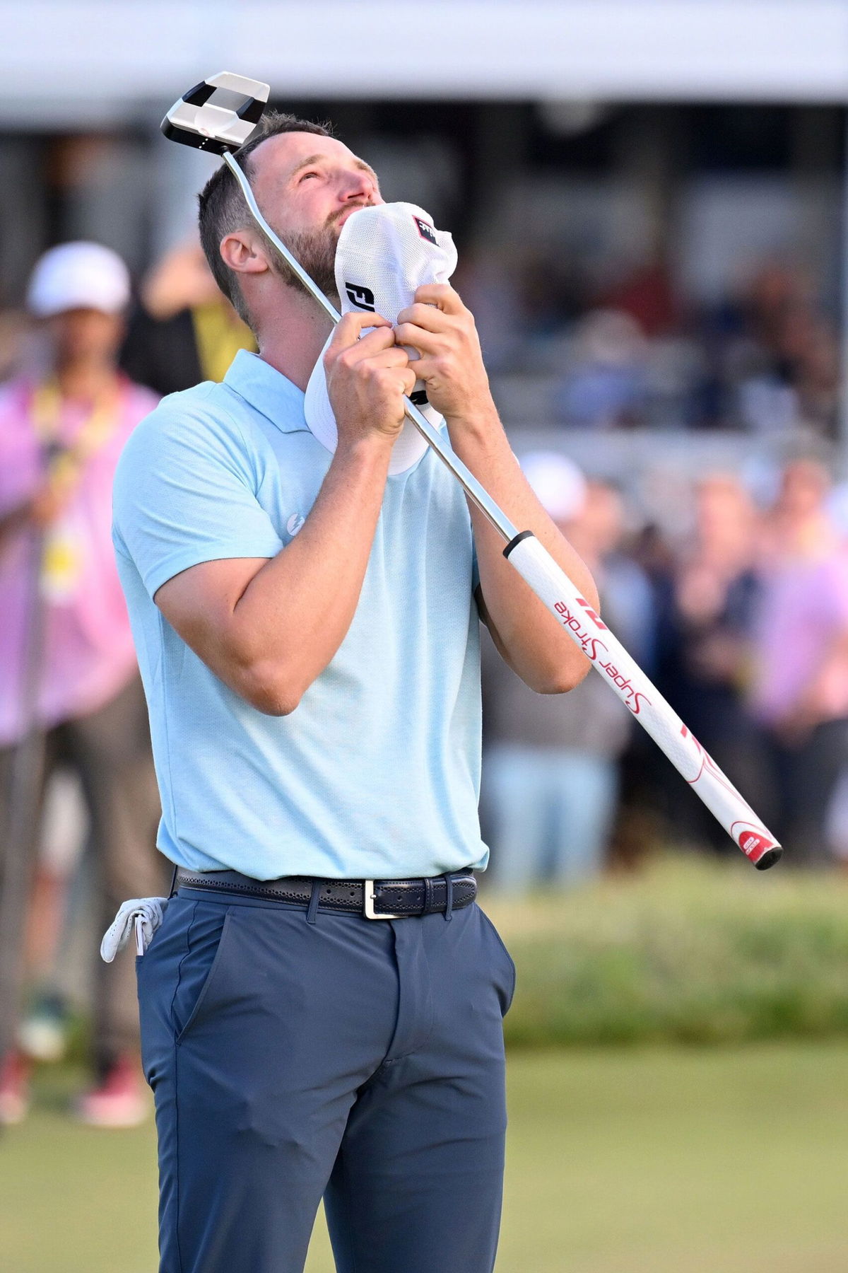 <i>Ross Kinnaird/Getty Images</i><br/>An emotional Wyndham Clark celebrates his win.