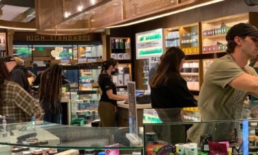 Employees work at CannaCraft's March and Ash retail cannabis store in San Diego's Mission Valley neighborhood.