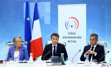 French President Emmanuel Macron (center) held a crisis meeting