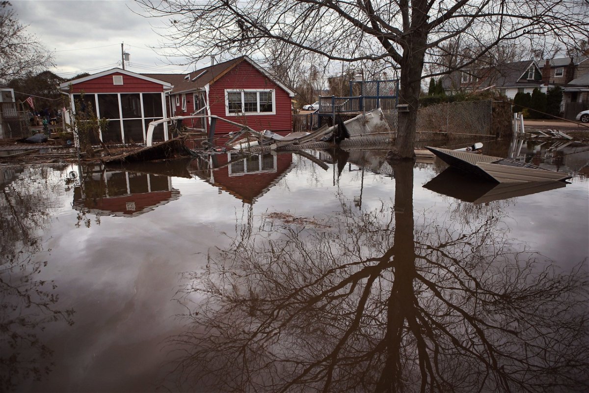 <i>John Moore/Getty Images</i><br/>Water floods the Ocean Breeze neighborhood of New York City's Staten Island in 2012 after Superstorm Sandy.