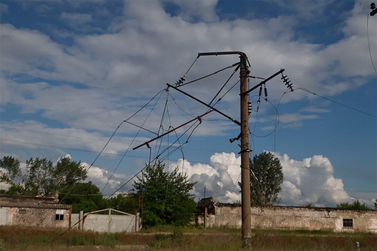 <i>Yan Dobronosov/Global Images Ukraine/Getty Images</i><br/>An electricity pylon and power lines in Kupiansk