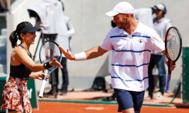 Kato in action with German mixed doubles partner Tim Puetz on Monday.