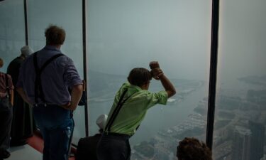 The Toronto skyline is covered by smoke on June 28 at the CN Tower.