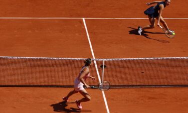 Kostyuk (right) and Sabalenka face each other at the French Open.