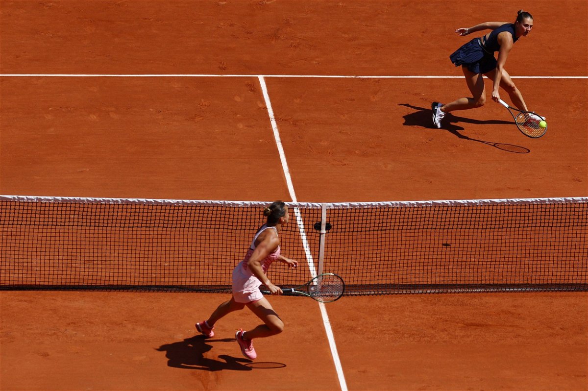 <i>Kai Pfaffenbach/Reuters</i><br/>Kostyuk (right) and Sabalenka face each other at the French Open.