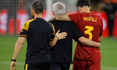 Jose Mourinho (middle) embraces Roma defender Roger Ibañez (right) at the end of the Europa League final.
