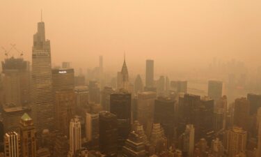 Heavy smoke shrouds the Chrysler Building and One Vanderbilt in a view from the Empire State Building as the sun sets on June 6 in New York City.