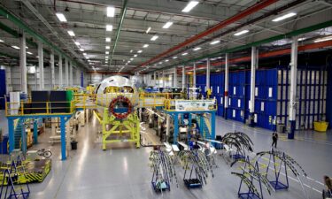 A Boeing 787 composite forward fuselage section sits on the factory floor at Spirit AeroSystems in Wichita