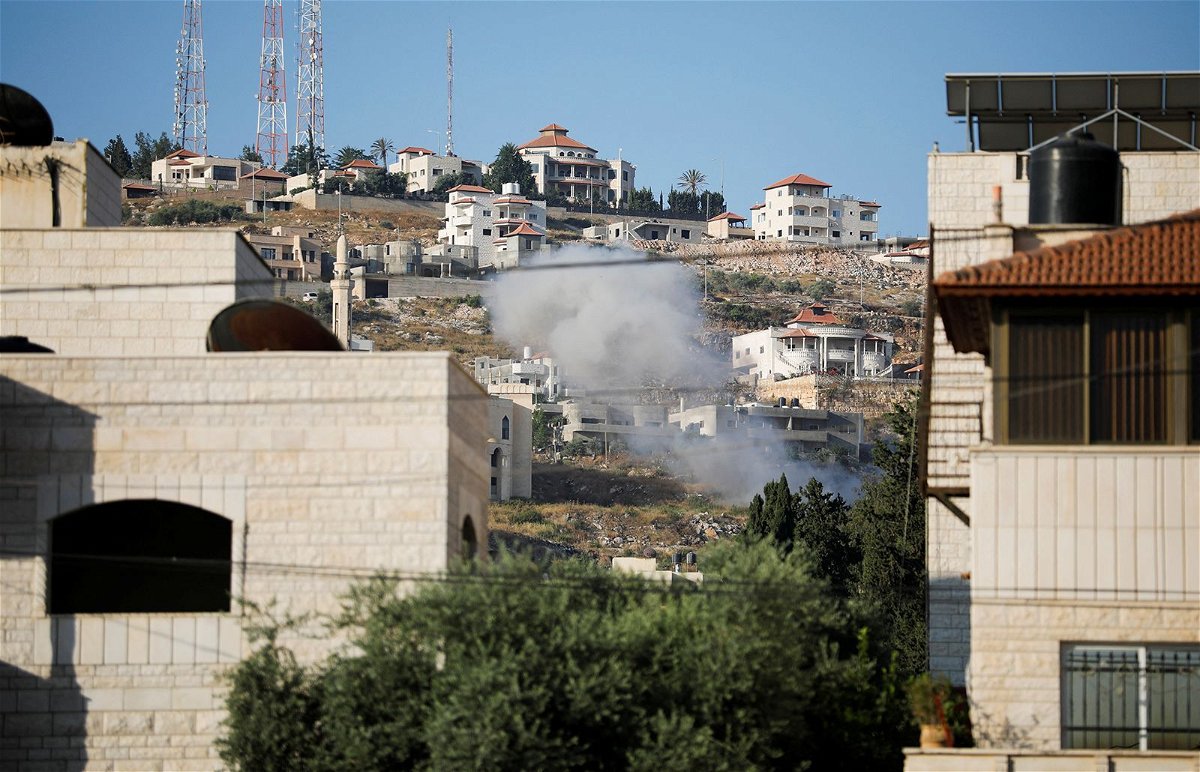 <i>Raneen Sawafta/Reuters</i><br/>Smoke is seen rising into the air during an Israeli raid in Jenin