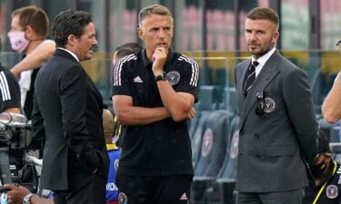 David Beckham (right) and Phil Neville talk before Inter Miami's game against CF Montréal on May 12