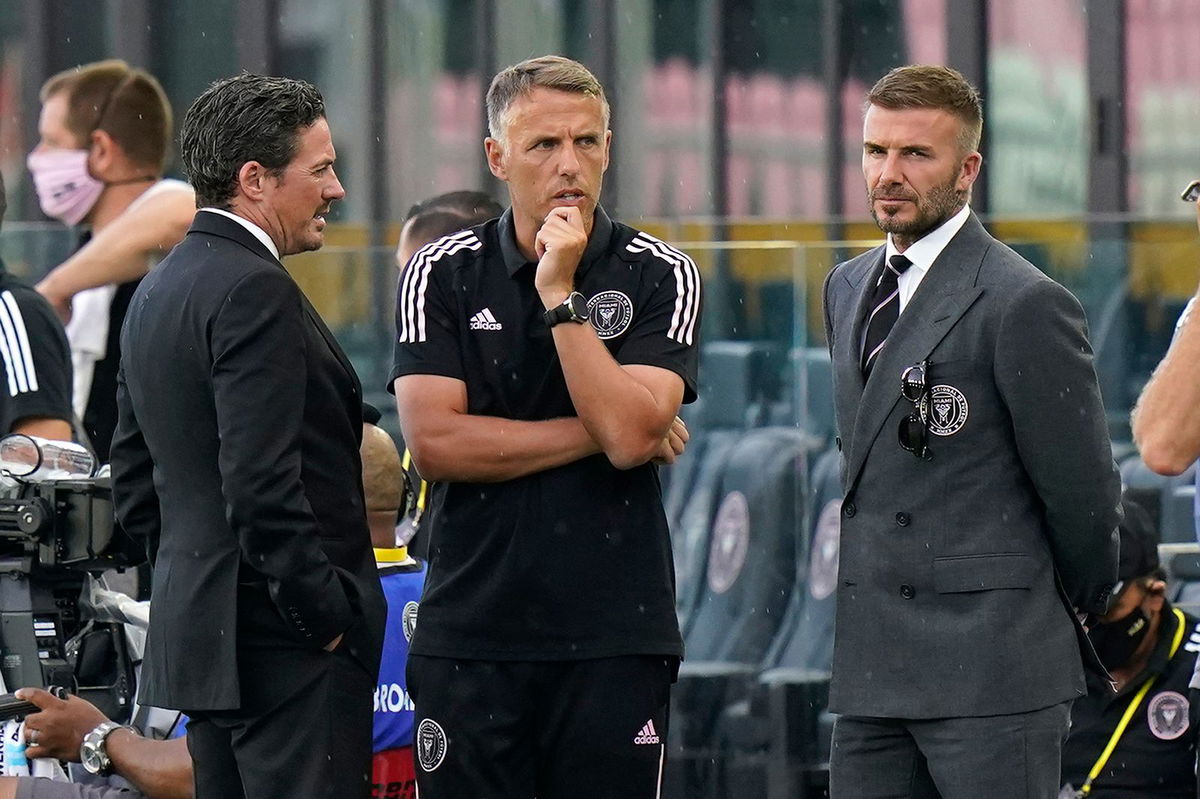 <i>Lynne Sladky/AP</i><br/>David Beckham (right) and Phil Neville talk before Inter Miami's game against CF Montréal on May 12