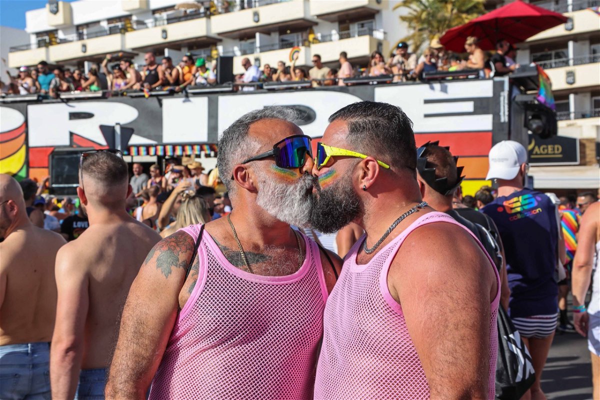 <i>Europa Press/Getty Images</i><br/>Two men kiss during the Gay Pride Maspalomas 2023