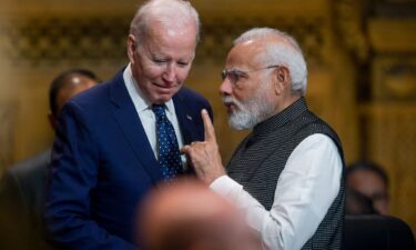 US President Joe Biden (L) talks with India's Prime Minister Narendra Modi at the opening of the G20 Summit in Nusa Dua on the Indonesian resort island of Bali in November 2022.