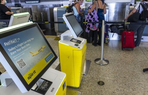 Spirit Airlines self check-in kiosks are pictured at the Oakland International Airport in Oakland