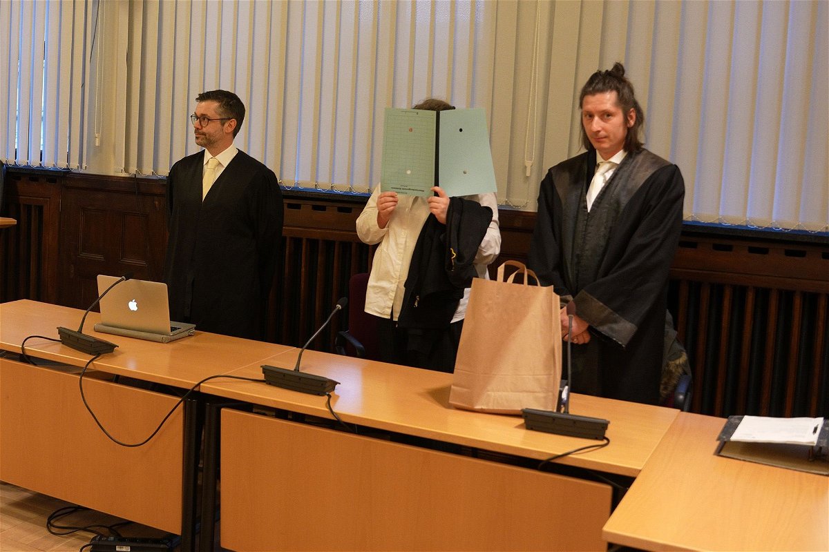 <i>Thomas Frey/picture alliance/Getty Images</i><br/>The defendant pictured standing between her lawyers at the start of her trial in January.