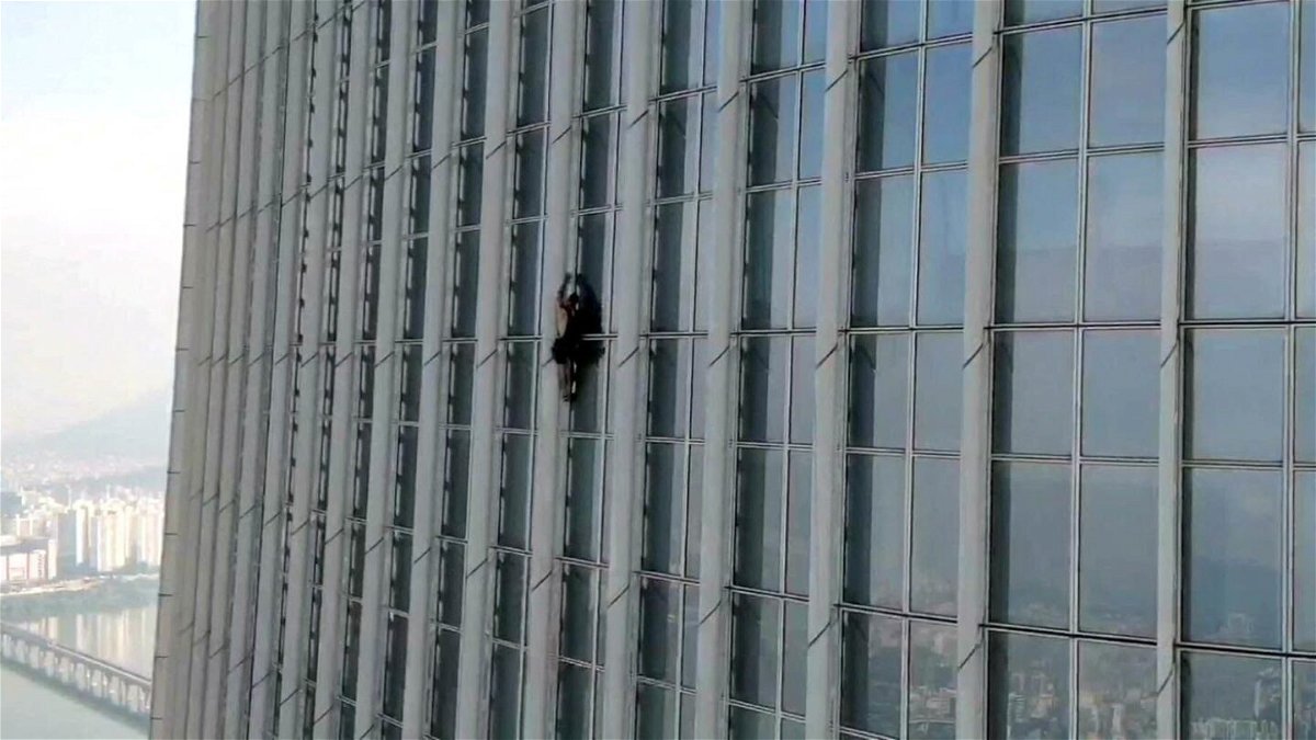 <i>South Korea's Songpa Fire Station/Handout/Reuters</i><br/>A British man climbs South Korea's tallest building