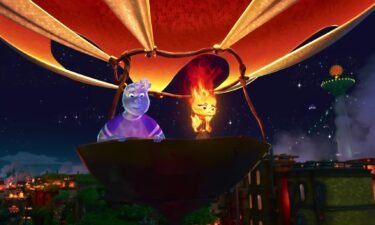 Wade (voiced by Mamoudou Athie) and Ember (Leah Lewis) in Pixar's "Elemental."