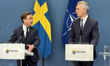 Swedish PM Ulf Kristersson (left) and NATO Secretary-General Jens Stoltenberg hold a press conference in Stockholm on March 7. The decision to allow a mosque-burning protest may threaten Sweden's chances of joining NATO