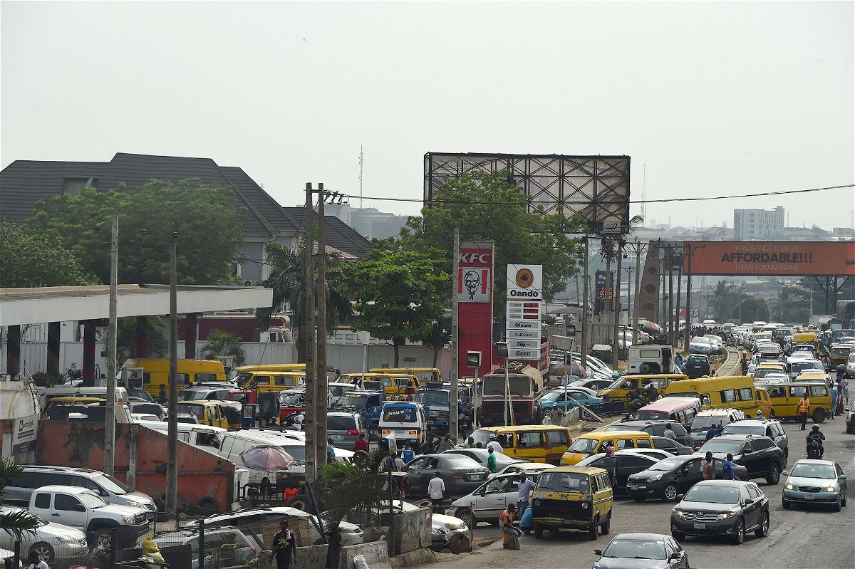 <i>Pius Utomi Ekpei/AFP/Getty Images</i><br/>Drivers have been lining up at gas stations in Nigeria after the country's new leader abruptly scrapped a controversial fuel subsidy.