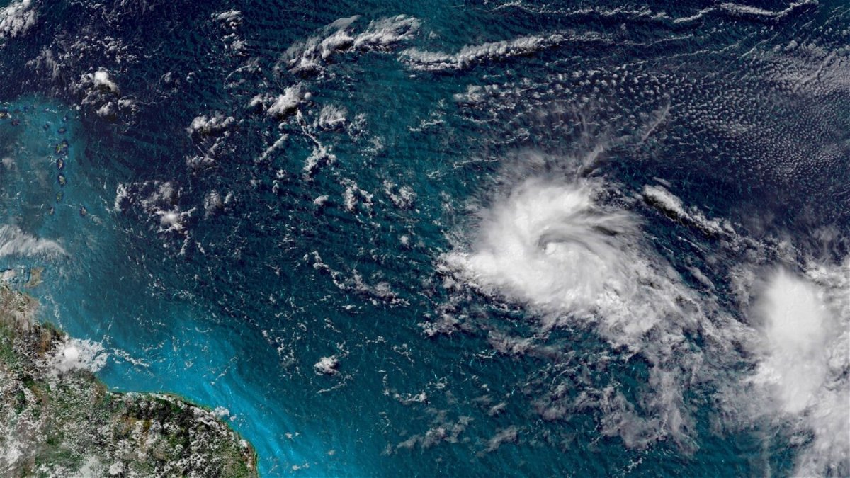 <i>CNN Weather</i><br/>Tropical Depression Three is seen around 11:30 a.m. ET Monday.