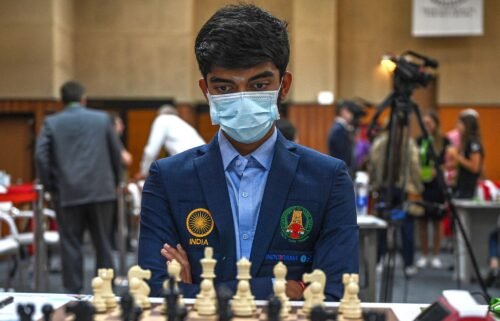 Dommaraju Gukesh surveys the board during his round nine game against the Azerbaijan team at the 44th Chess Olympiad on August 7