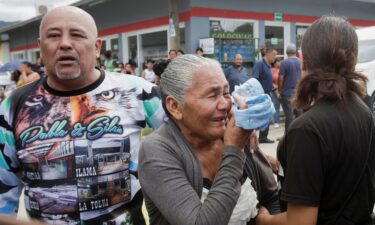 Relatives of inmates react as they wait for news about their loved ones outside the Centro Femenino de Adaptacion Social women's prison on June 20.