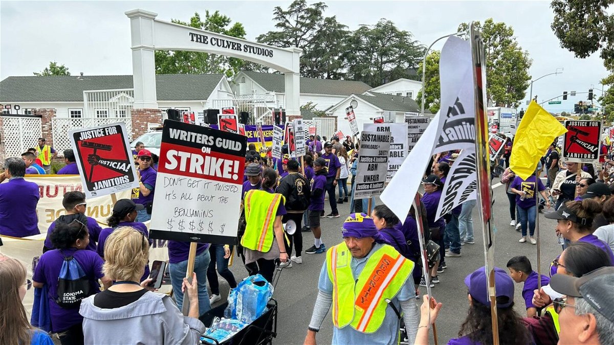 <i>Writers Guild of America West/Twitter</i><br/>Janitors from SEIU United Service Workers West and Writer's Guild of America strikers join together at The Culver Studios picket in Culver City