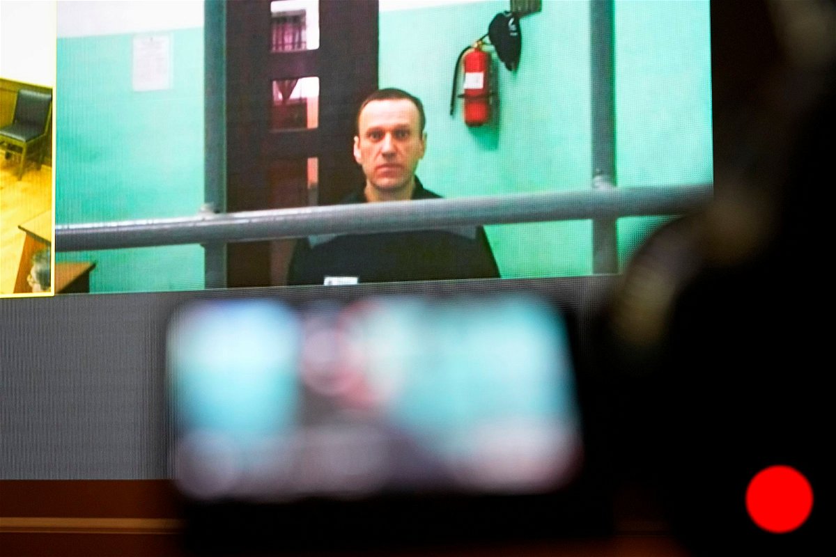 <i>Alexander Zemlianichenko/AP</i><br/>Navalny appears in a video link during a hearing at the Russian Supreme Court in Moscow