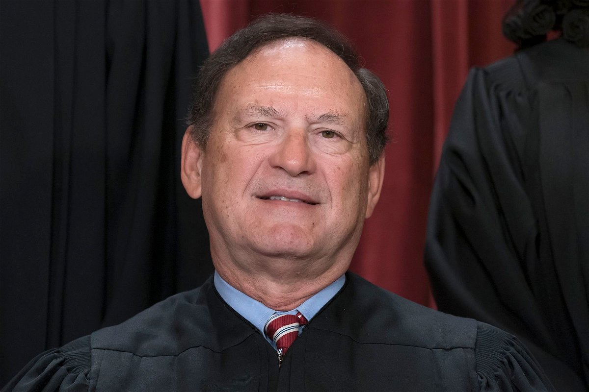 <i>J. Scott Applewhite/AP</i><br/>Associate Justice Samuel Alito joins other members of the Supreme Court as they pose for a new group portrait