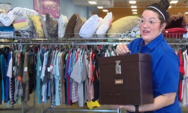 A tin box with a secret compartment led a Goodwill employee to discover a hidden treasure. The box looked empty