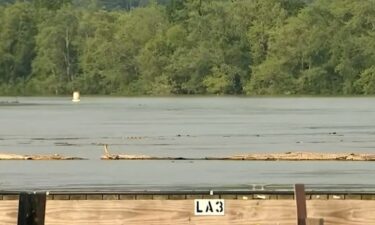 A dock holding several boats breaks free from the Seaboard Marina and floats down the Connecticut River.