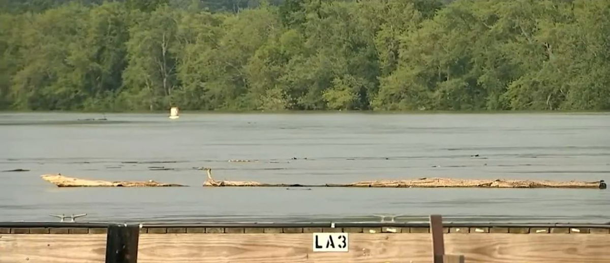 <i></i><br/>A dock holding several boats breaks free from the Seaboard Marina and floats down the Connecticut River.