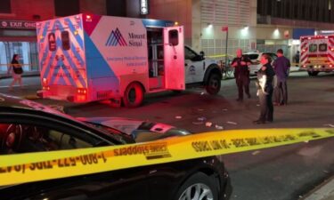 Police say an EMT was stabbed multiple times by a patient inside an ambulance outside of Mount Sinai West in Manhattan.