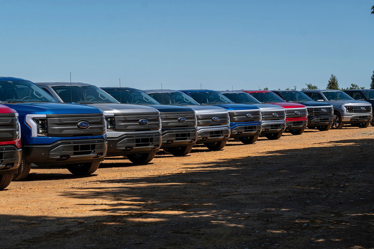 <i>David Paul Morris/Bloomberg/Getty Images</i><br/>Ford Lightning F-150 pickup trucks during a media event at Vino Farms in Healdsburg