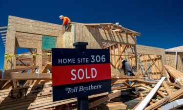 Pictured is a "Sold" sign outside a house under construction at Folsom housing community in Folsom