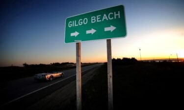 A sign along the west side of Ocean Parkway points to Gilgo Beach on Long Island in May 2011.