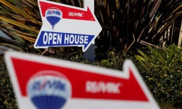 RE/MAX Holdings Inc. signage is displayed outside of an open house in Redondo Beach