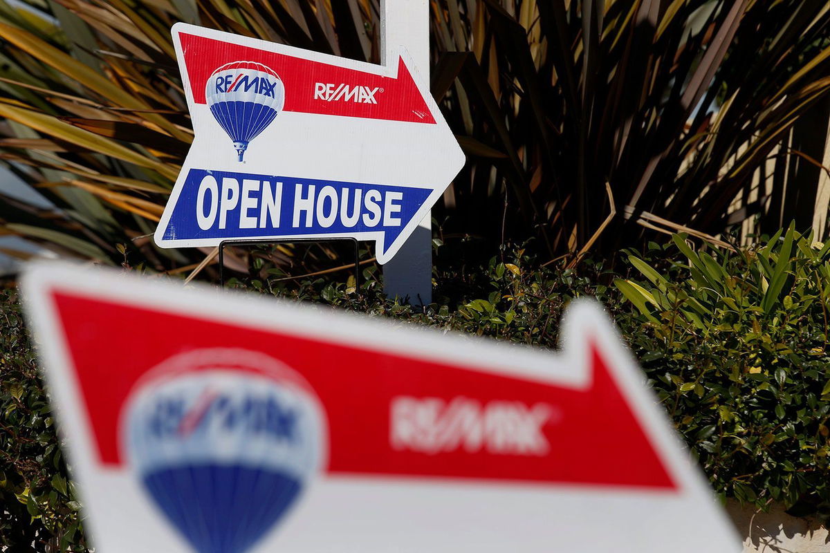 <i>Patrick T. Fallon/Bloomberg/Getty Images/FILE</i><br/>RE/MAX Holdings Inc. signage is displayed outside of an open house in Redondo Beach