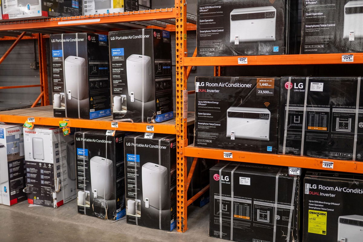 <i>Sergio Flores/Bloomberg/Getty Images</i><br/>Air conditioners displayed for sale at a Home Depot store during a heatwave in Austin