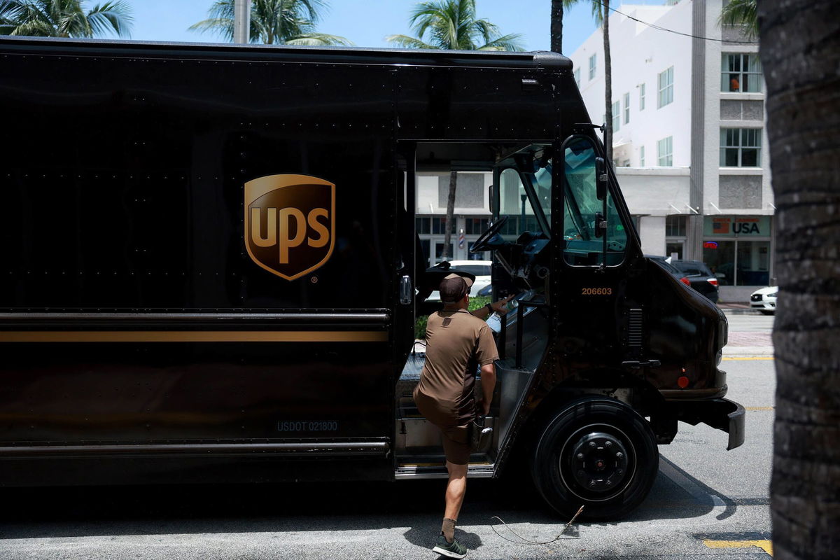 <i>Joe Raedle/Getty Images</i><br/>A UPS driver makes a delivery on June 30 in Miami