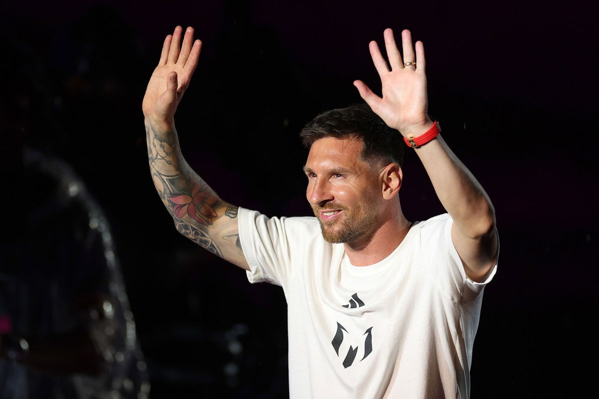 <i>Mike Ehrmann/Getty Images</i><br/>Lionel Messi waves to fans as he is introduced during 