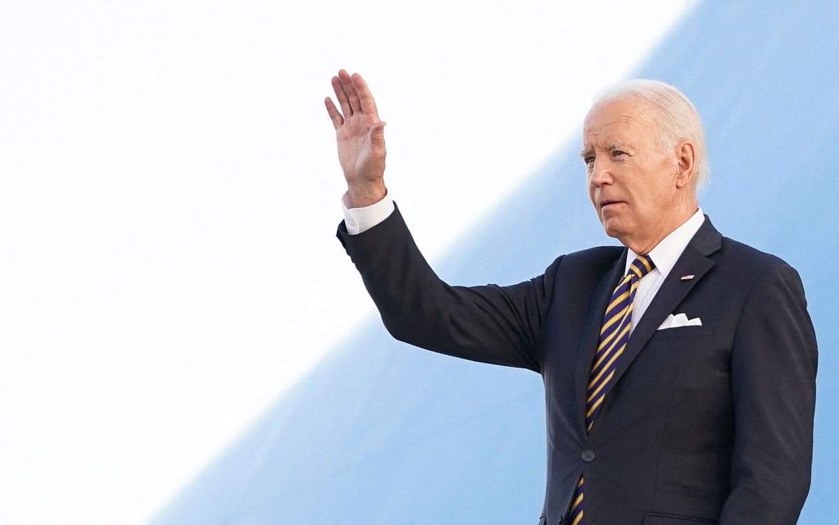<i>Kevin Lamarque/Reuters</i><br/>U.S. President Joe Biden waves upon arrival in Helsinki