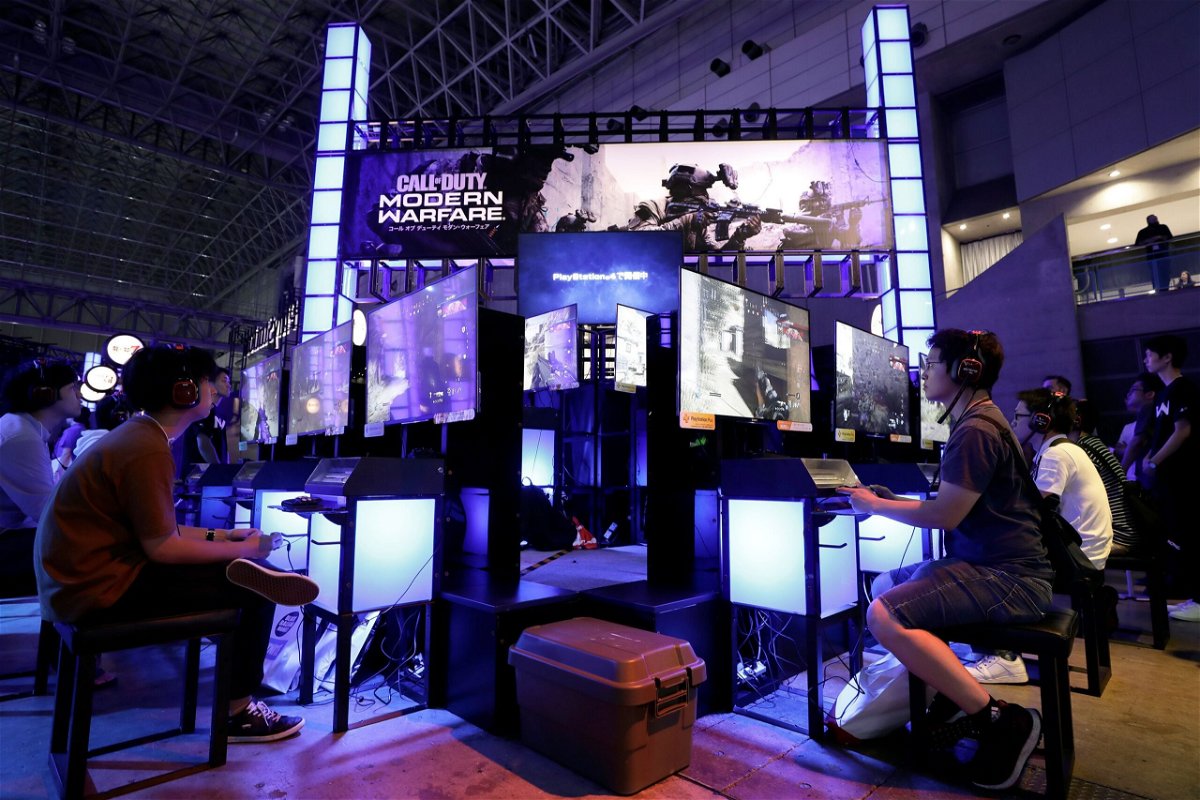 Attendees use Sony Corp. PlayStation 4 (PS4) game consoles to play the Call of Duty: Modern Warfare video game at the Tokyo Game Show 2019 in Chiba