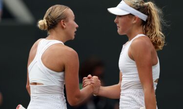 Russia's Mirra Andreeva (R) shakes hands with compatriot Anastasia Potapova after their third-round match.