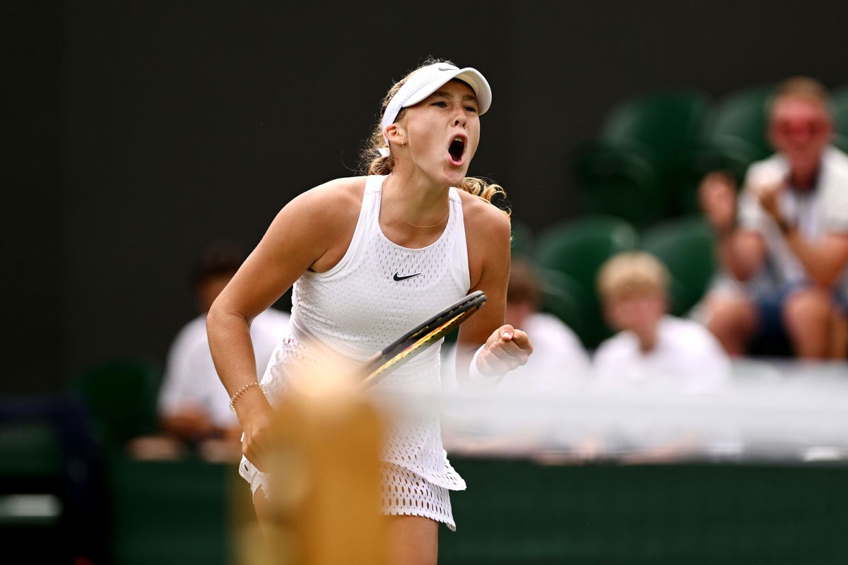 <i>Mike Hewitt/Getty Images</i><br/>Mirra Andreeva celebrates against Anastasia Potapova in the Wimbledon third round.