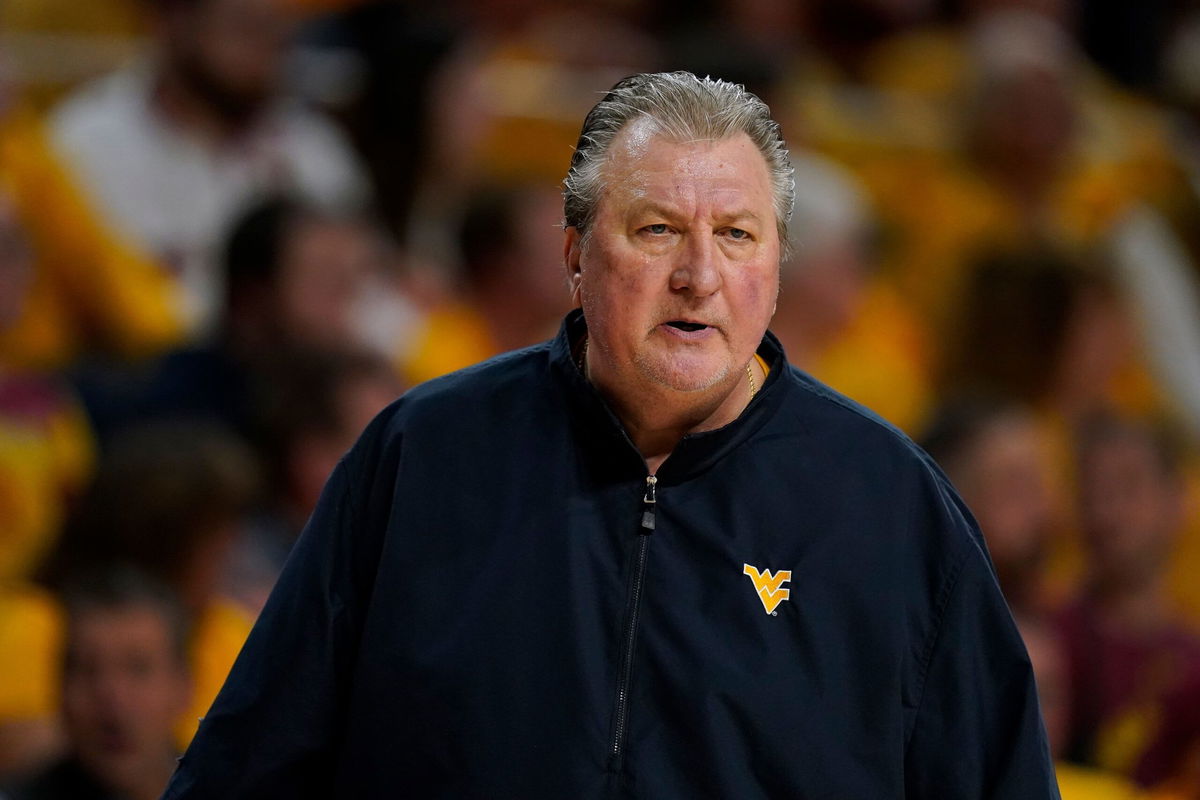 <i>Charlie Neibergall/AP</i><br/>Bob Huggins watches from the bench during the first half of an NCAA college basketball game against Iowa State on February 27