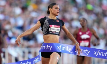 Sydney McLaughlin-Levrone breaks the tape at the US track and field championships.