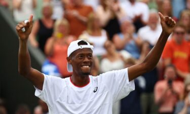 Christopher Eubanks celebrates winning his fourth-round match at Wimbledon against Stefanos Tsitsipas.